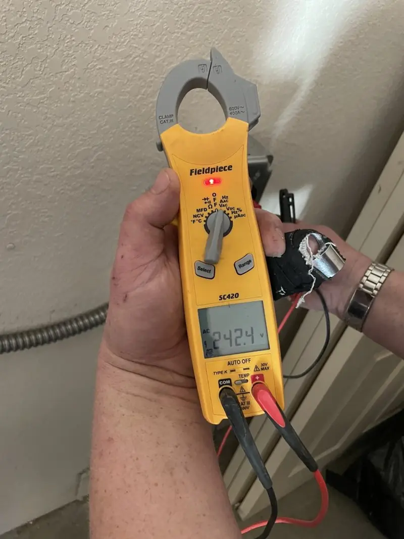 Voltage testing with clamp meter during Generator Installation in Newberry